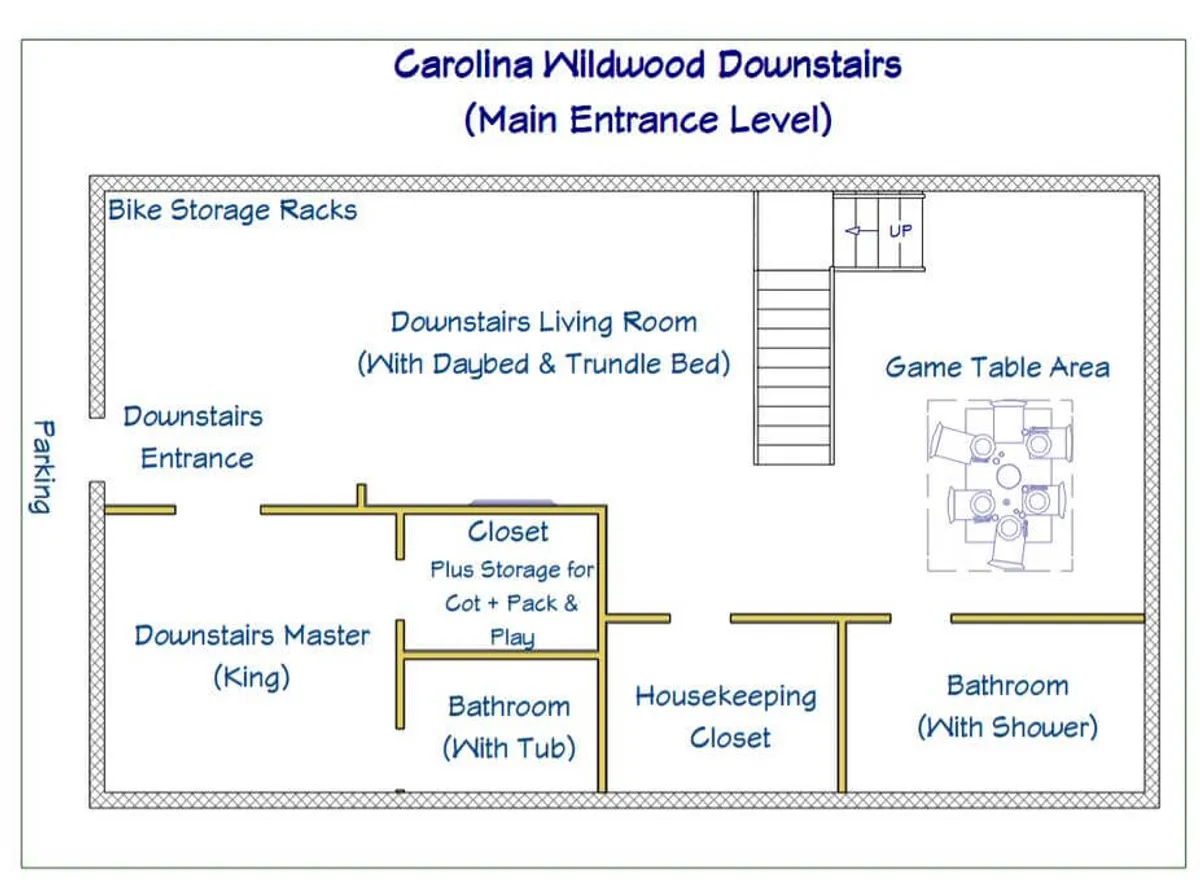 This image showcases bike storage racks, a downstairs living room area, a game table, and visible bathrooms. The inclusion of the bike storage and game area hints at the home’s suitability for active guests and the ease with which one can transition from outdoor fun to indoor relaxation.